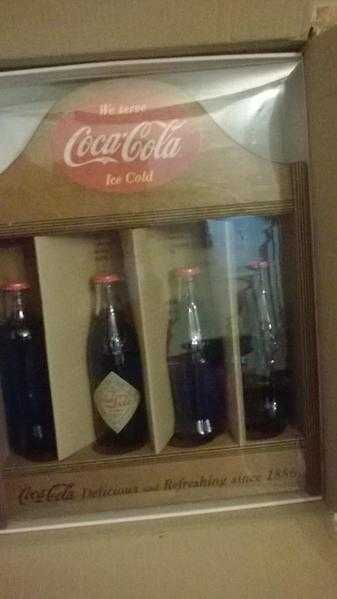 125yrs anniversary of coca cola 4 bottles and collectors case