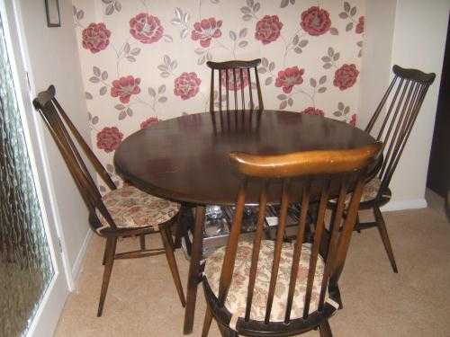 1980s round ercol tablechairs