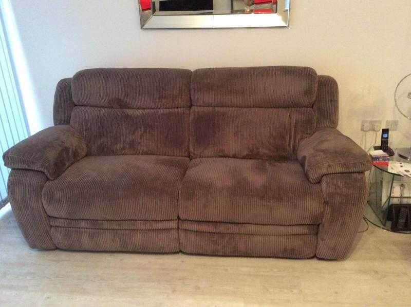 2 amp 3 seater sofas from Furniture Village with recliners and storage pouffe ...2 yrs old ...immacula