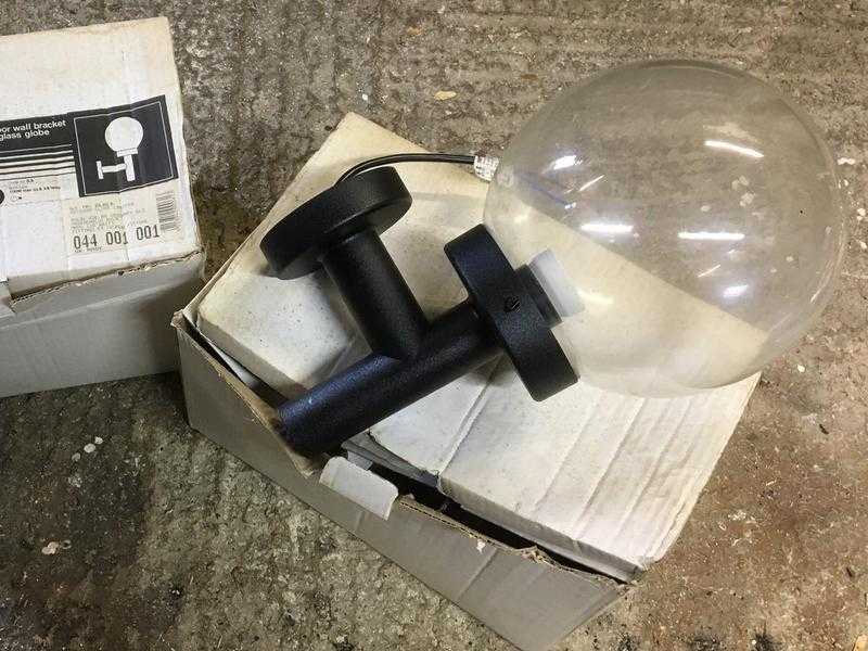 2 black outdoor light wall brackets with globes. 15 pair.  Identical 039new old stock039, with bulbs