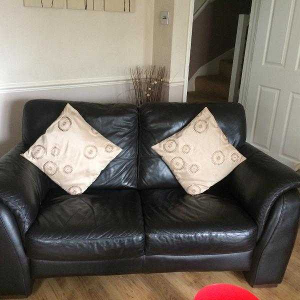 2 brown leather sofas