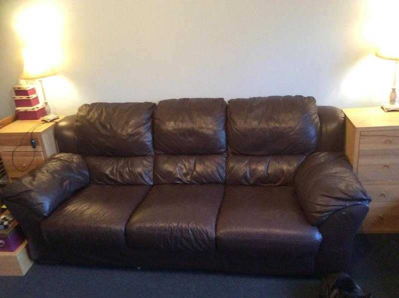 2 brown leather sofas