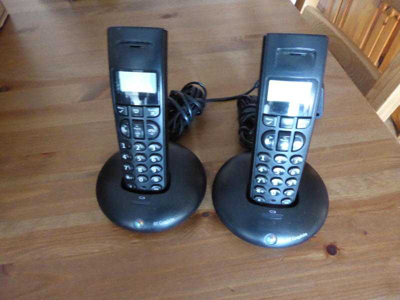 2 BT Graphite Handsets with Charging cradles.