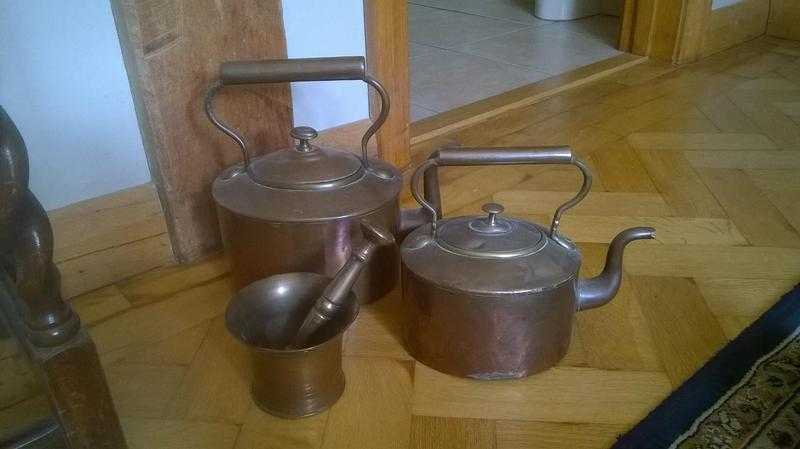 2 copper kettles and a brass pestle and morter