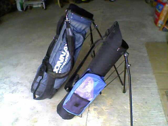 2 golf bags with stands (both for 5)