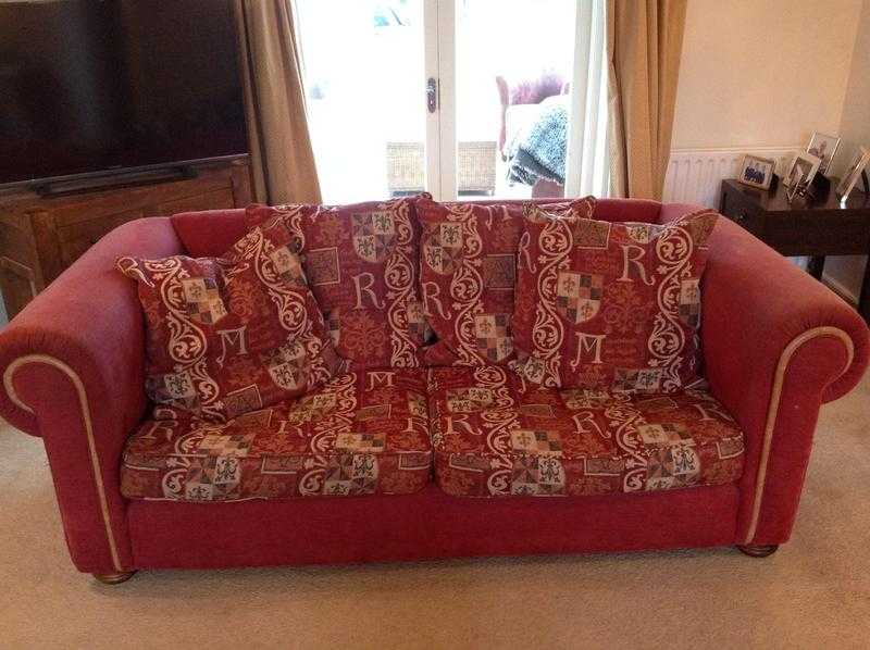 2 large maroon and gold sofas .. Make me an offer
