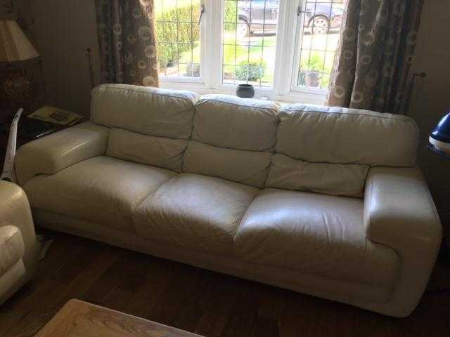 2 light cream  leather sofas 2x3 seater