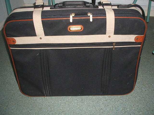 2 Matching Roncato wheeled full size suitcases