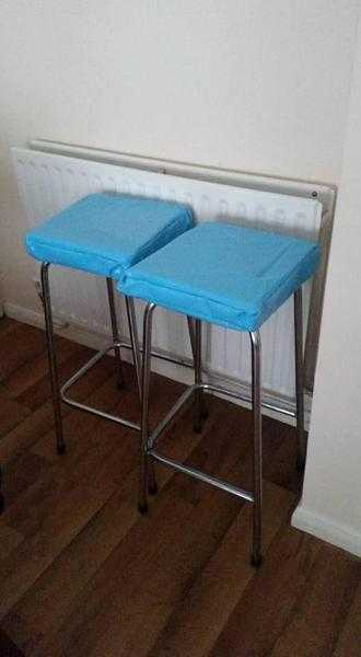 2 metal framed stools, blue water resistant seat