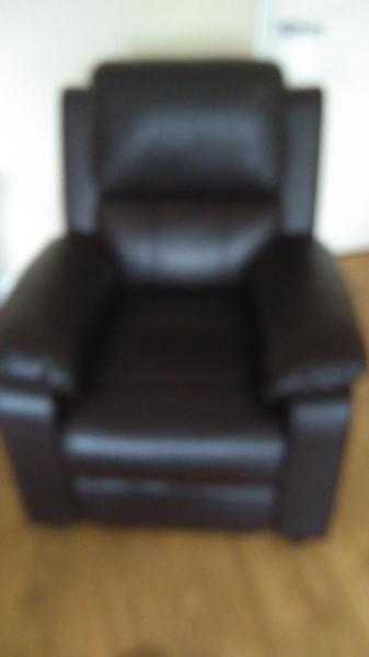 2 recliner chairs brown