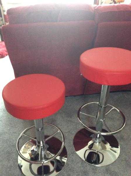 2 Red, gas lift, bar stools