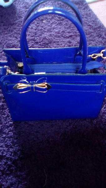 2 sacks of handbags and purses for sale