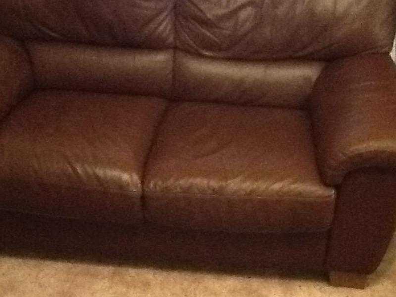 2 seater brown leather sofa.