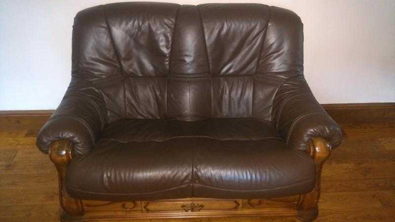 2 seater leather sofa. solid oak base