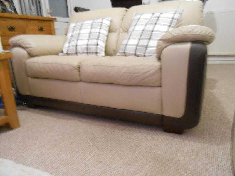 2 seater real leather settee.