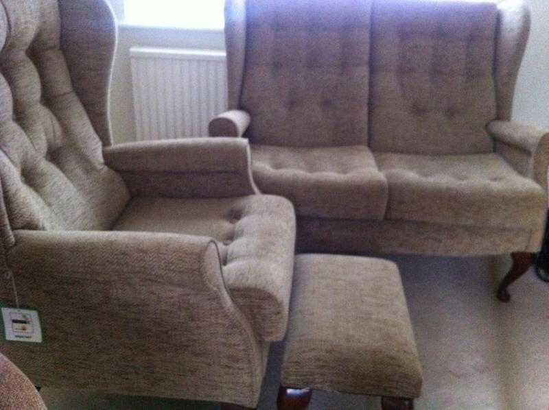 2 seater sofa with matching armchair  Footstool