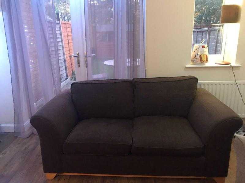 2 seats brown sofa