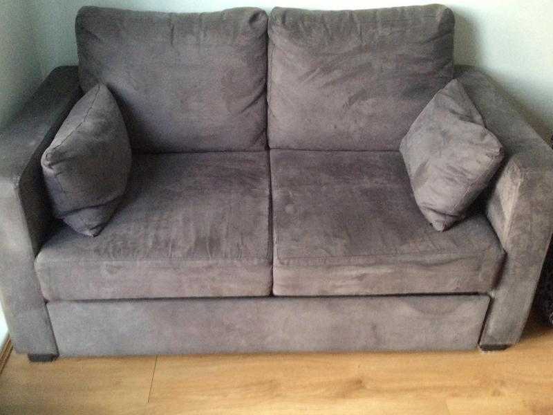 2 seatter bed settee grey suede in very good condition for collection only 50.ono