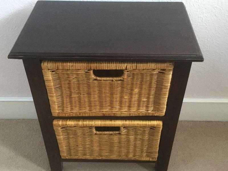 2 solid dark wood chests with two wicker drawers per chest