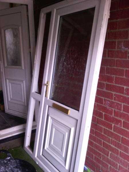2 upvc doors to clear door with letter box 34x81 also full panneled included