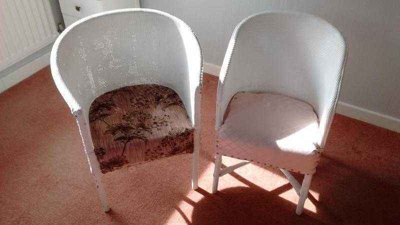 2 White Wrap Around Whicker Chairs