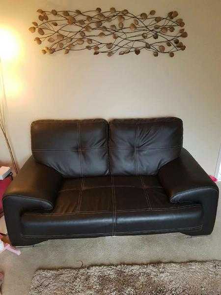 2 X black leather sofas