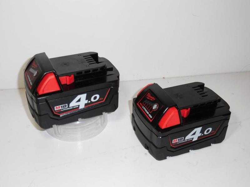 2 x Genuine Milwaukee M18B4 18V 4.0Ah Lithium Batteries fully working NEW