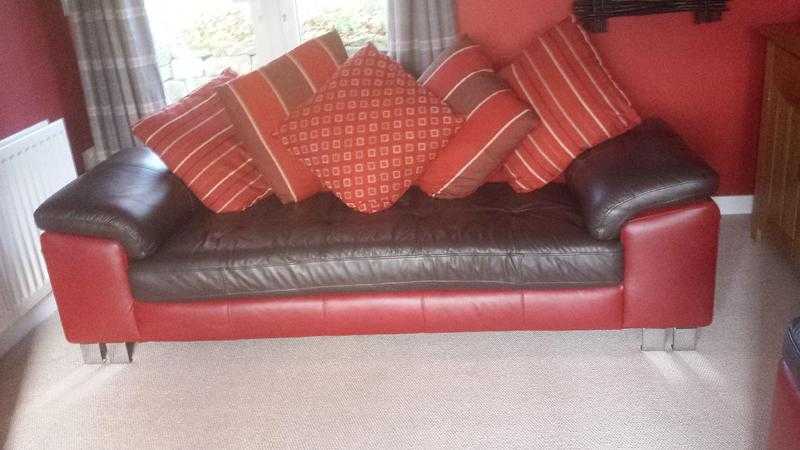 2 x high grade modern leather sofas in redbrown leather....fantastic offer