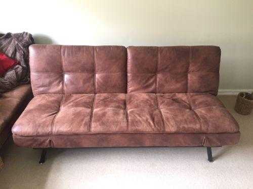 2 x matching Brown Faux leather sofa beds