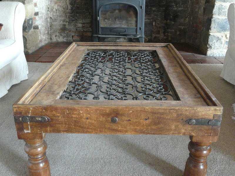 20C iron bound wooden coffee table with wrought iron centre