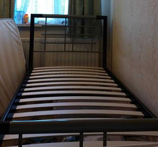 2single metal beds for sale for just 100 each with firm mattress included.Under warranty. Look new