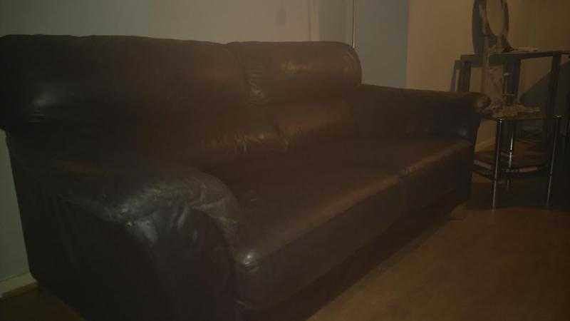2x2 seater Modern Black leather couchessofas for sale 60ono. 2nd couch is longer and seats 3 easy.