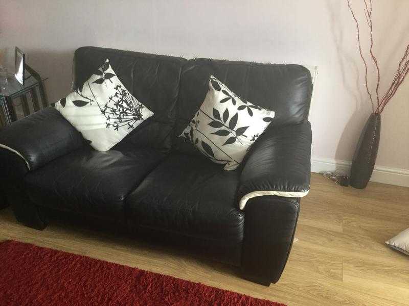 2x2 seater sofas and pouffe