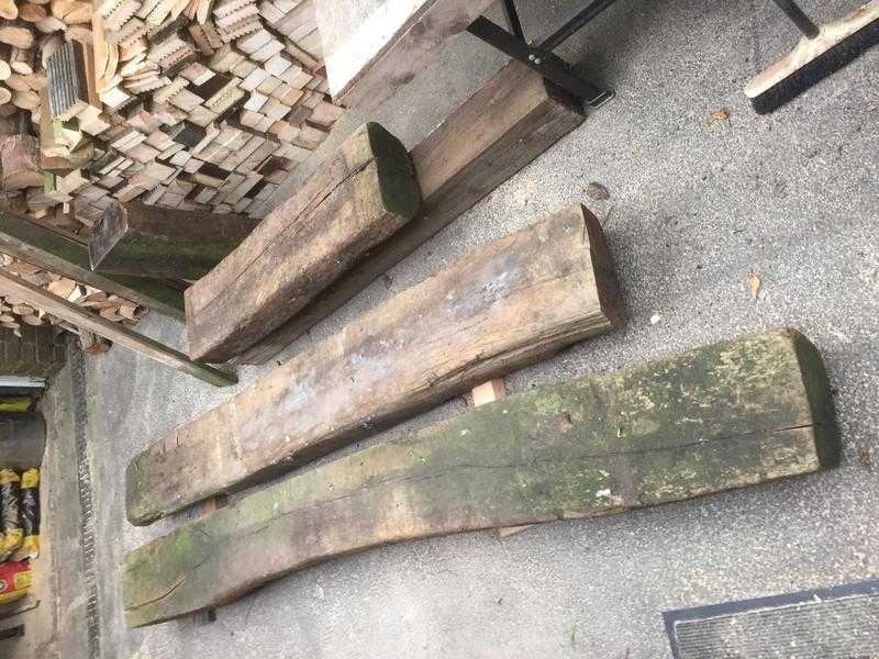 3 lengths of solid reclaimed timber and 4 large slatted wooden benches