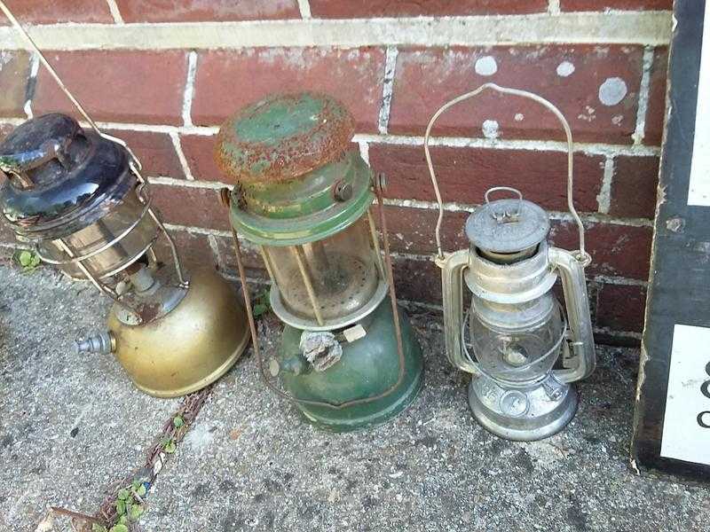 3 paraffin lanterns