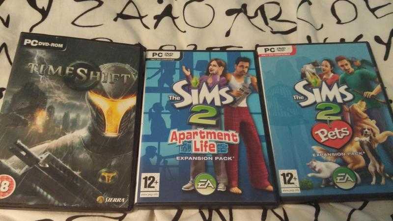 3 PC Games - TimeShift, The Sims 2 Apartment Life, The Sims 2 Pets.