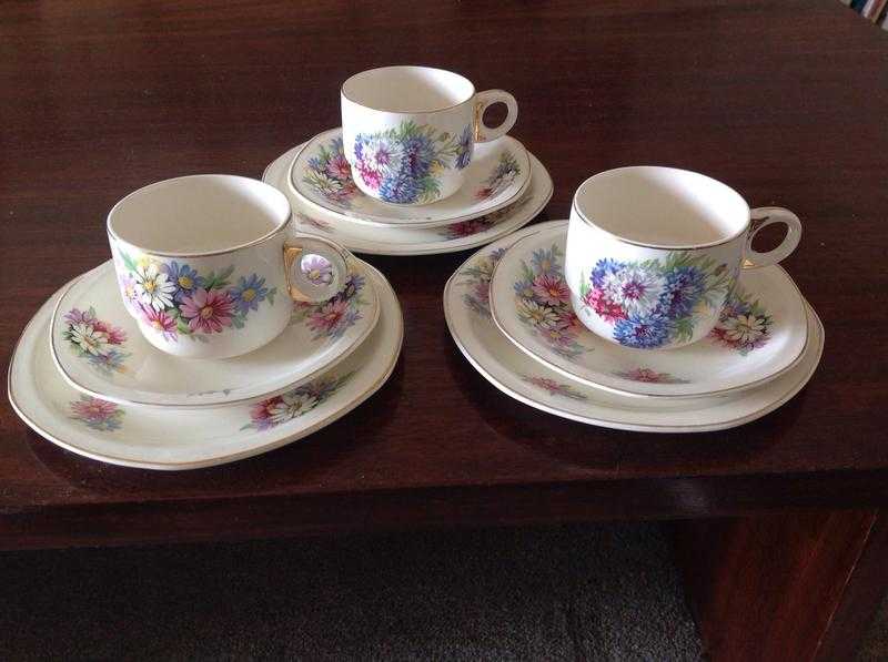 3 picnic cups and saucers and plates. approx 1950-60