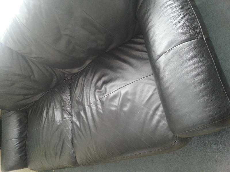 3 seater black leather sofa.