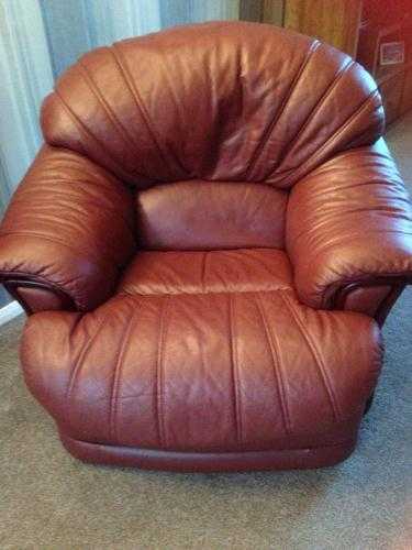 3 seaterLeather suite , one arm chair and one recliner swivel chair