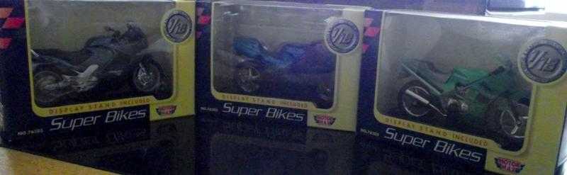 3 super bikes in boxes