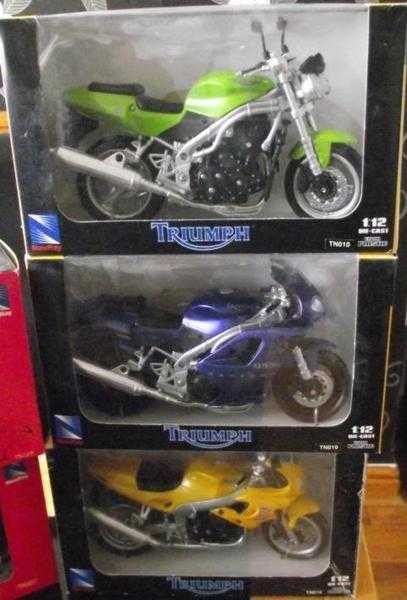 3 triumph die cast 112 motorbikes in boxes never been opened
