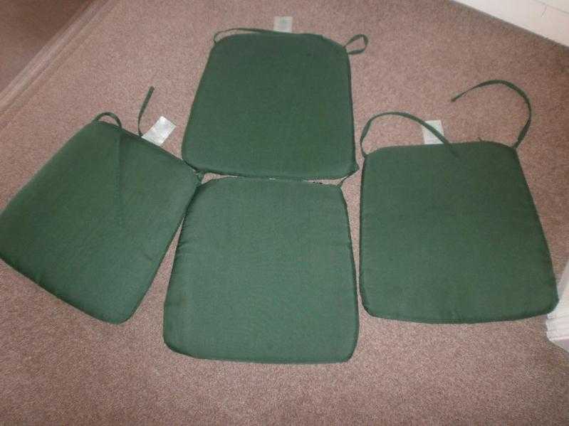 4 dark green seat pads