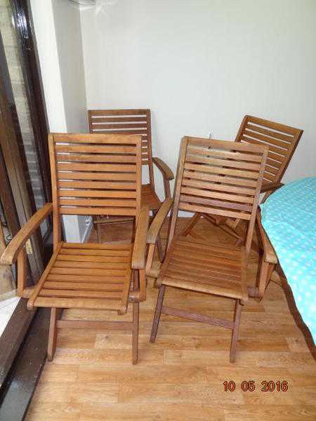 4 folding wooden chairs