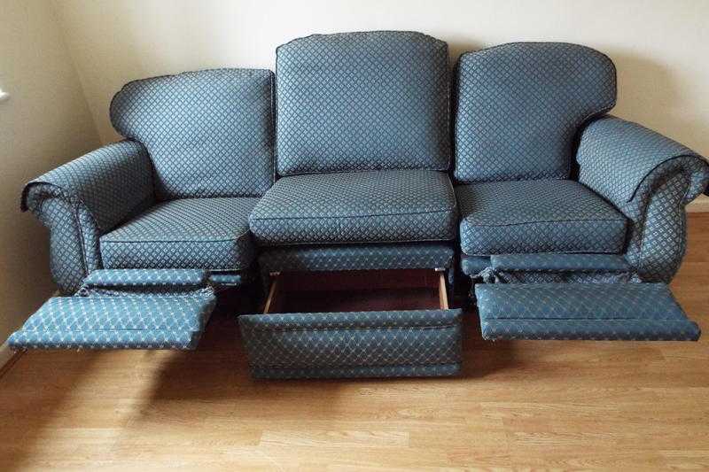 4 Seater sofa with 2 recliners and built in drawer and patterned shade of blue fabric