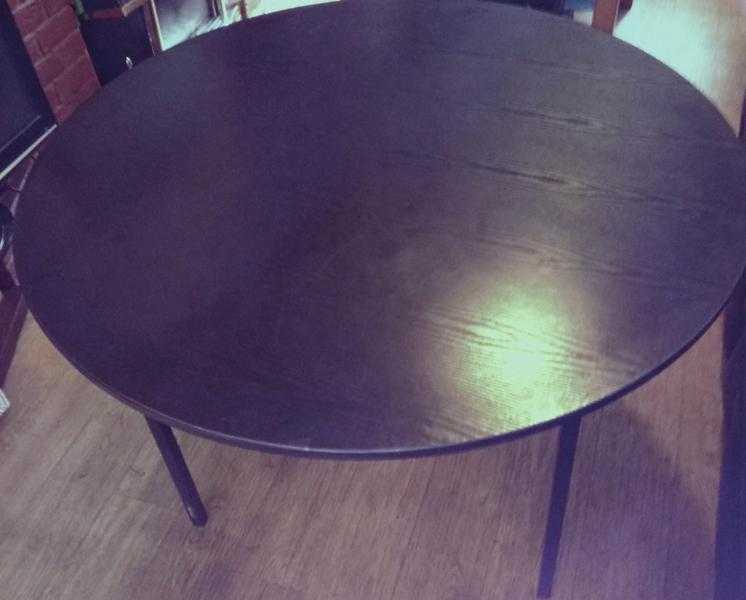 4ft round table in black wood effect surface