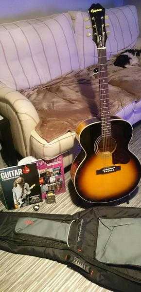 4month old acoustic guitar with all essentials for sale