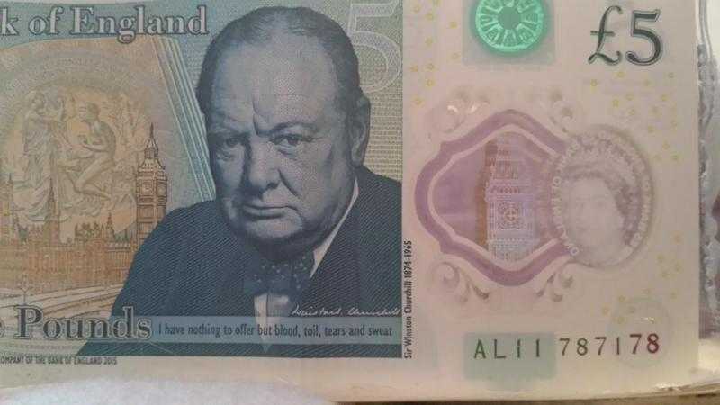 5 pound plastic note Serial number is AL11 787178