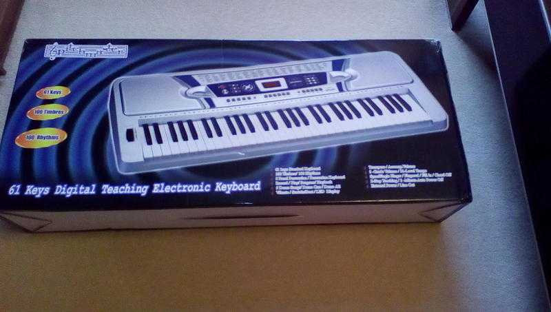 61 keys digital electronic keyboard, brand new in case.