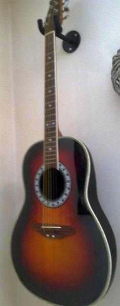 7F - TS Encore elcacoustic roundback 6 string in good working order-age related marks. great sound.