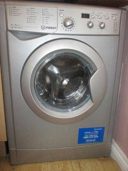 8 month old Indesit washerdryer, Silver.